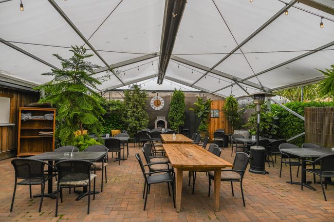 View of patio featuring outdoor dining area | Image 32