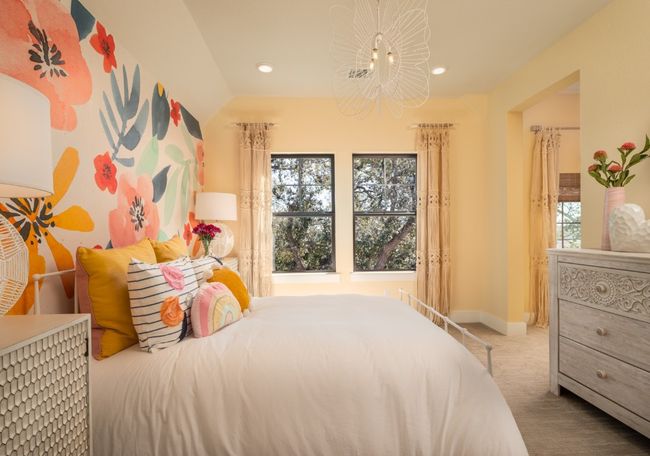 Carpeted bedroom with multiple windows, recessed lighting, and a chandelier | Image 11