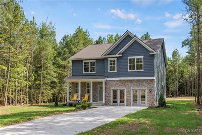 Craftsman house with covered porch and a front yard | Image 1