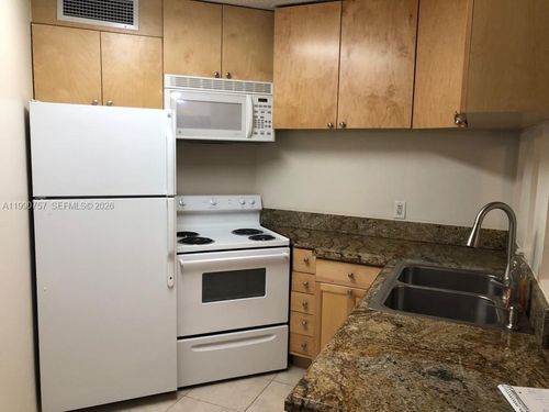103-215 Lake Pointe Dr, Oakland Park, FL, 33309-3589 | Card Image