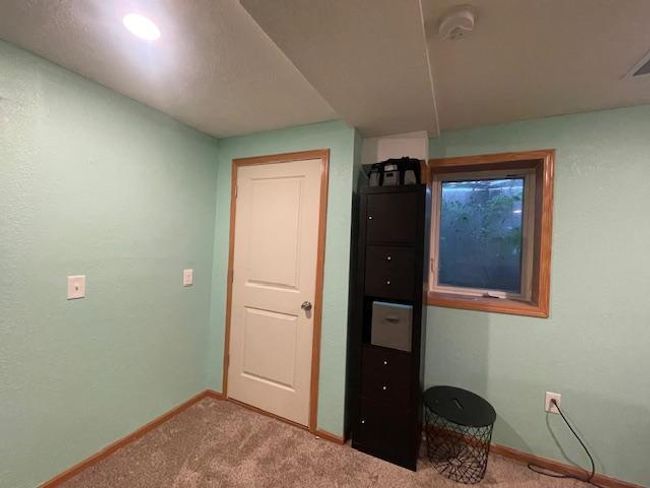 Lower Level Includes Egress Window, A Bathroom & the utility Room. | Image 19