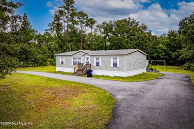 54758 Sheffield Road, House other with 3 bedrooms, 2 bathrooms and null parking in Callahan FL | Image 2