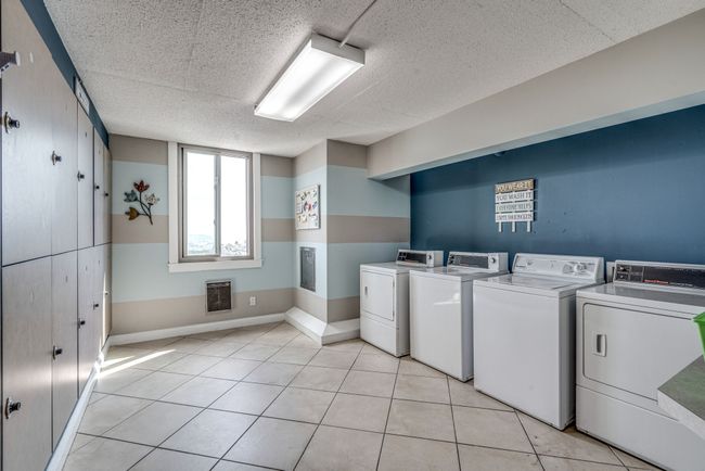 As part of the HOA amenities, each floor features a dedicated laundry room complete with private lockers. Unit 11K is conveniently located directly across the hall, ensuring effortless access for all your laundering needs. | Image 32