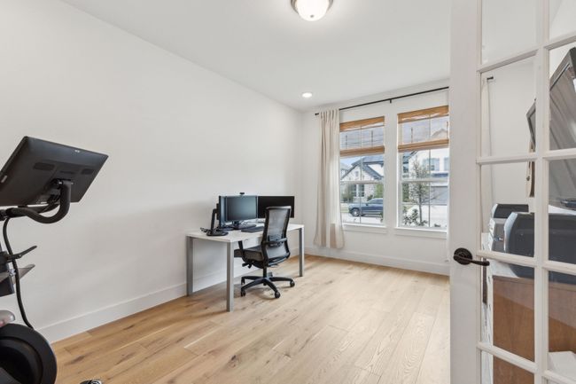 Bonus room with upgraded french doors. Seller had builder add extra insulation to make this space sound proof! Could be a media, game room or another bedroom. | Image 29