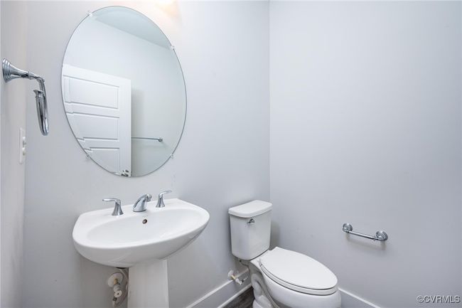 Half bath with baseboards and toilet | Image 11