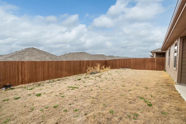 View of yard featuring a fenced backyard | Image 24