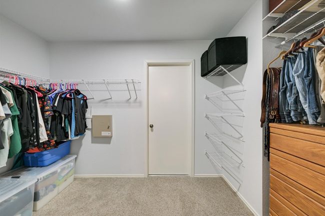 Walk in closet with carpet flooring | Image 12