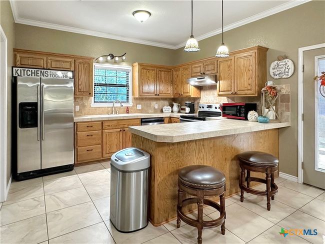 720 E Travis St, House other with 3 bedrooms, 2 bathrooms and null parking in Luling TX | Image 7