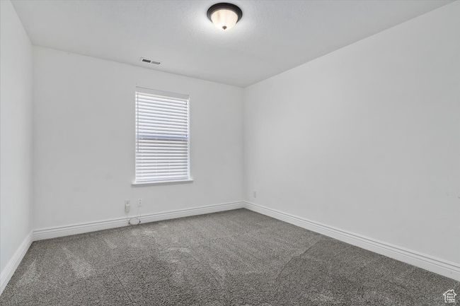 Unfurnished room featuring carpet flooring | Image 25
