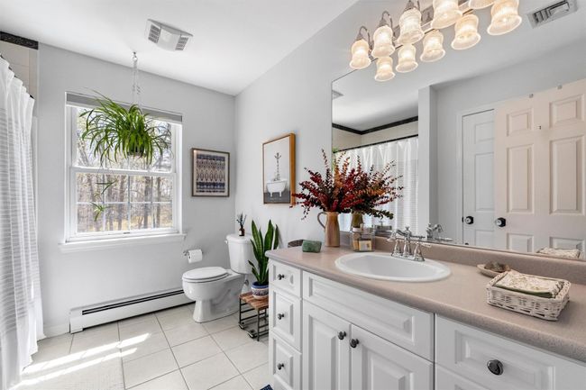 Spacious hallway bathroom. | Image 23