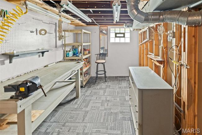 Below grade area featuring a workshop area | Image 26