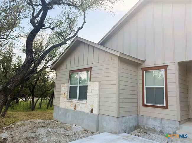 Side front view of home. | Image 34