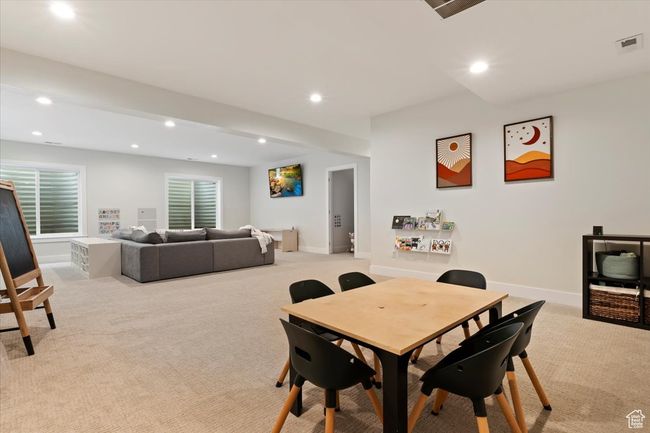Dining room with light carpet, baseboards, visible vents, and recessed lighting | Image 27