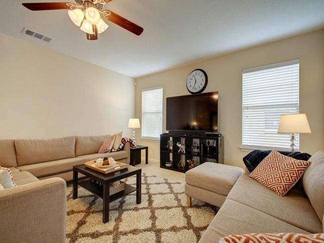 Staged earlier. Carpet replaced with Laminate flooring | Image 9