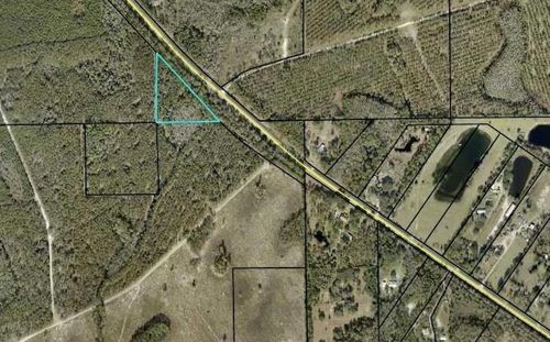1925 Heritage Crossrds Miles Of His Hwy, Bunnell, FL, 32110 | Card Image