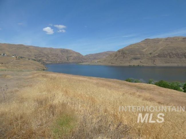Water view featuring a mountainous background | Image 14