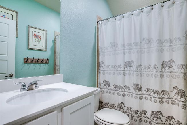 Bathroom with toilet and vanity | Image 20