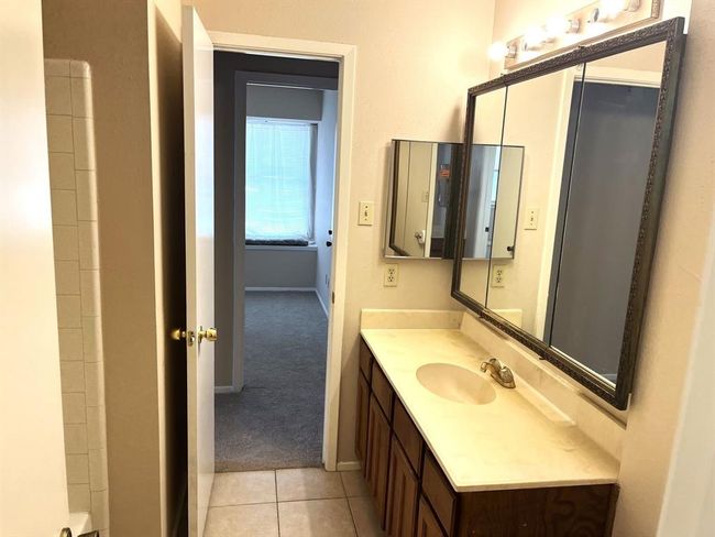 ... and another view showing how it connects to the main hallway and the other two bedrooms | Image 14
