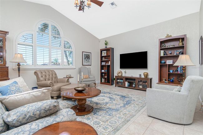 Plantation shutters - and a very big surprise. Take note of built-in bookshelf on the right | Image 31