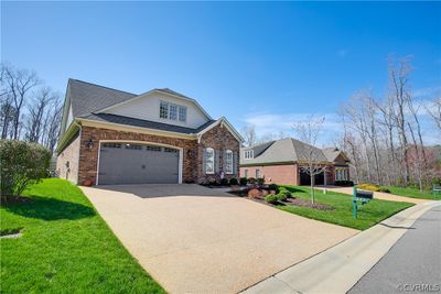 Front of property featuring a front yard and a​​‌​​​​‌​​‌‌​‌‌​​​‌‌​​‌‌​‌​​​​​‌ garage | Image 2