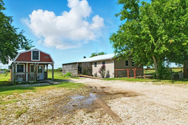Back of property with an outbuilding and a metal roof | Image 10
