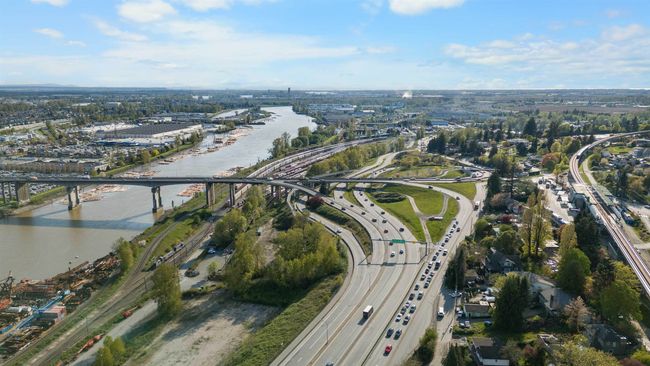 Aerial overview of property's location with a notable bridge and a nearby body of water | Image 35