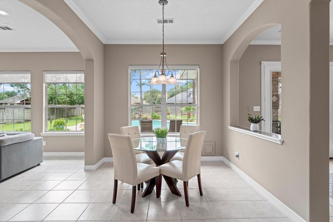 Large breakfast area overlooking the tropical backyard paradise! | Image 16
