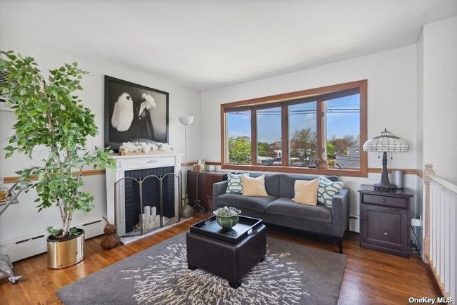 Living Room w/Brand New Railing, Andersen Windows and HW Floors! | Image 3