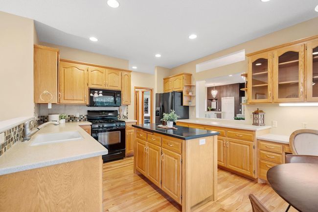 Spcaious kitchen with ample cupboard and counter space | Image 24