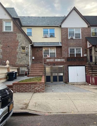 31-44 89th Street, Home with 6 bedrooms, 3 bathrooms and null parking in East Elmhurst NY | Image 1