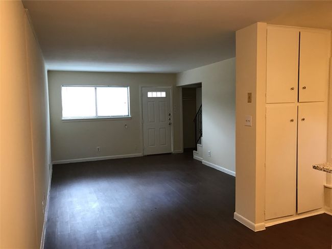 Entryway with baseboards, stairs, and dark wood finished floors | Image 15