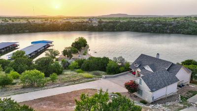 Aerial view at dusk featuring a water view | Image 3