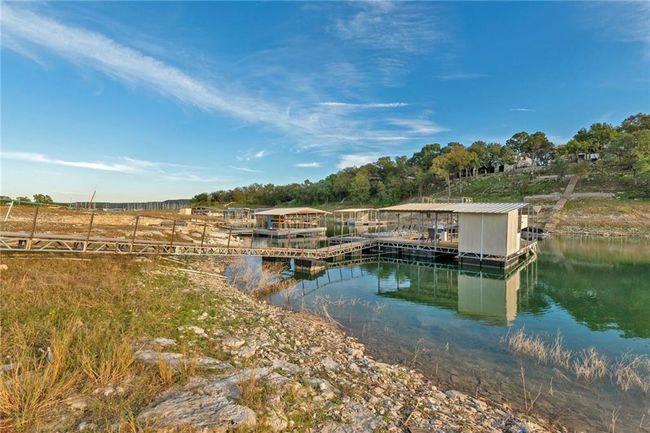 Dock area with a water view | Image 25