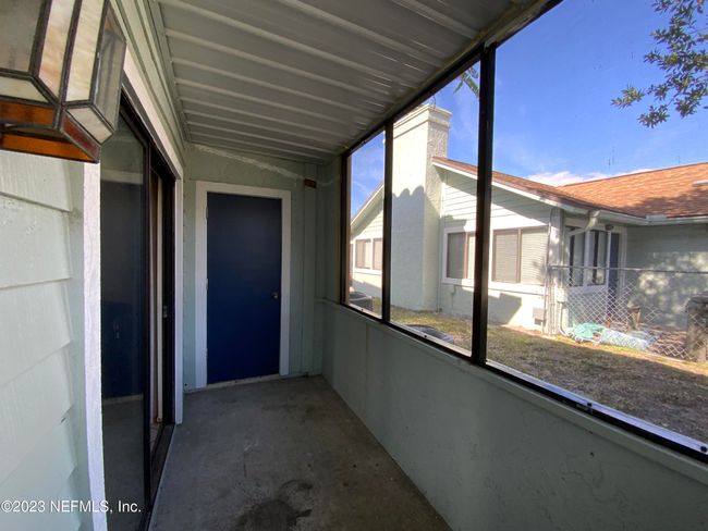 Rear Porch is screened with closet | Image 28