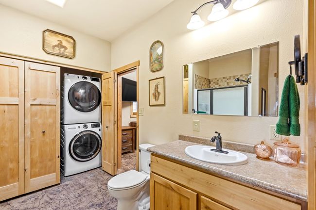 washer and dryer hookups off of main bedroom | Image 45
