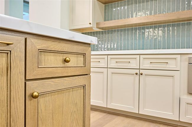 Beautiful wood-tone cabinetry by Kent Moore. | Image 22