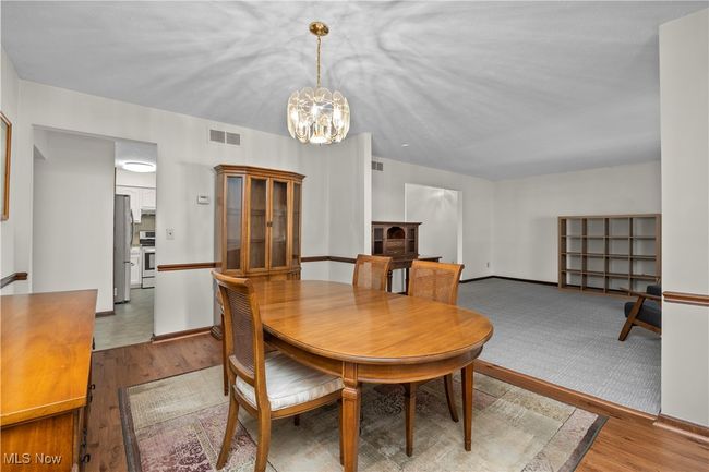 Dining room opens to living room | Image 10