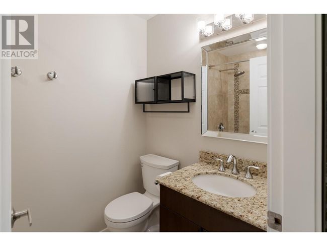101 - 1957 Kane Rd, Condo with 1 bedrooms, 2 bathrooms and 1 parking in Kelowna BC | Image 9