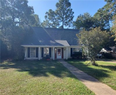 View of front of home with a front lawn | Image 1