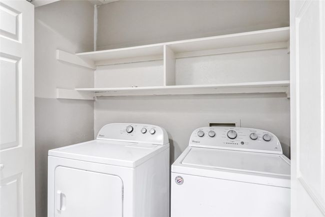 Washroom featuring washing machine and dryer | Image 22