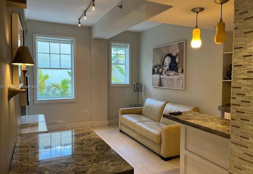 208-100 Collins Ave, Miami Beach, FL, 33139-7207 | Card Image