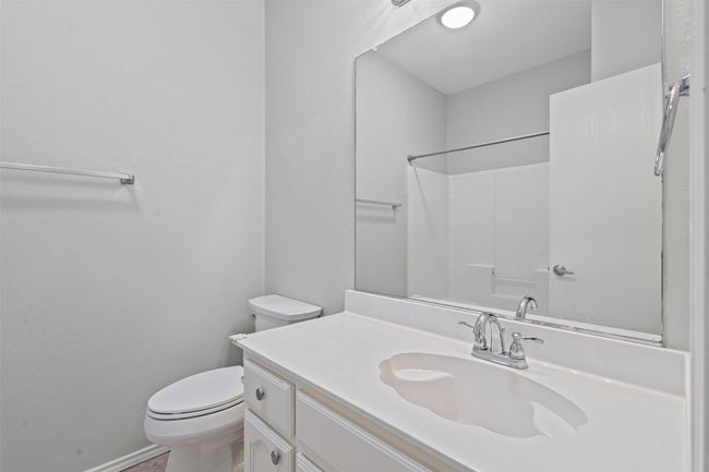 Bathroom with vanity and a shower | Image 9