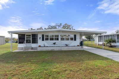 7477 Little Tee Lane, House other with 2 bedrooms, 2 bathrooms and null parking in Brooksville FL | Image 1