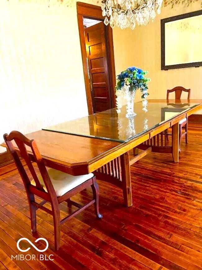 dining space with an inviting chandelier and hardwood / wood-style flooring | Image 9