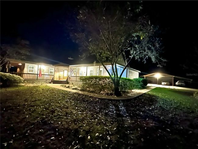 PLENTY OF LIGHTS ON PROPERTY | Image 72