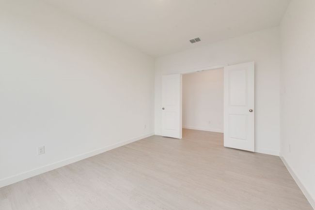 Empty room featuring light wood-type flooring and baseboards | Image 18