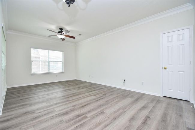 This versatile space offers plenty of natural light and ample room to create the perfect retreat tailored to your lifestyle. | Image 6