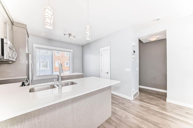 52 - 111 Rainbow Falls Gate, Townhouse with 2 bedrooms, 3 bathrooms and 2 parking in Chestermere AB | Image 6