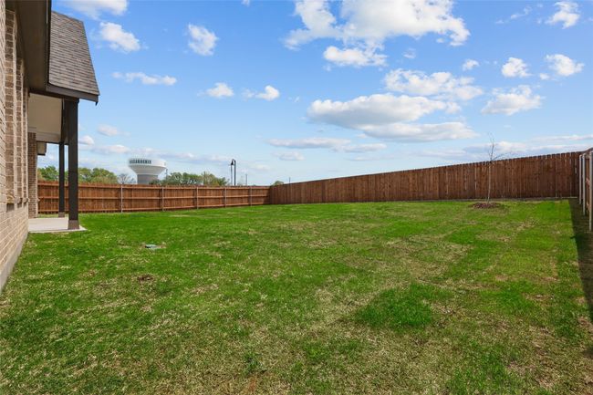 View of yard with a fenced backyard | Image 30