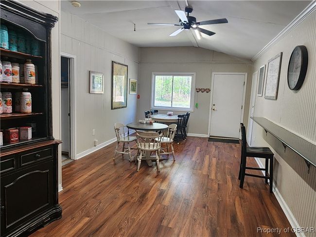 Additional room with back entrance door. | Image 18